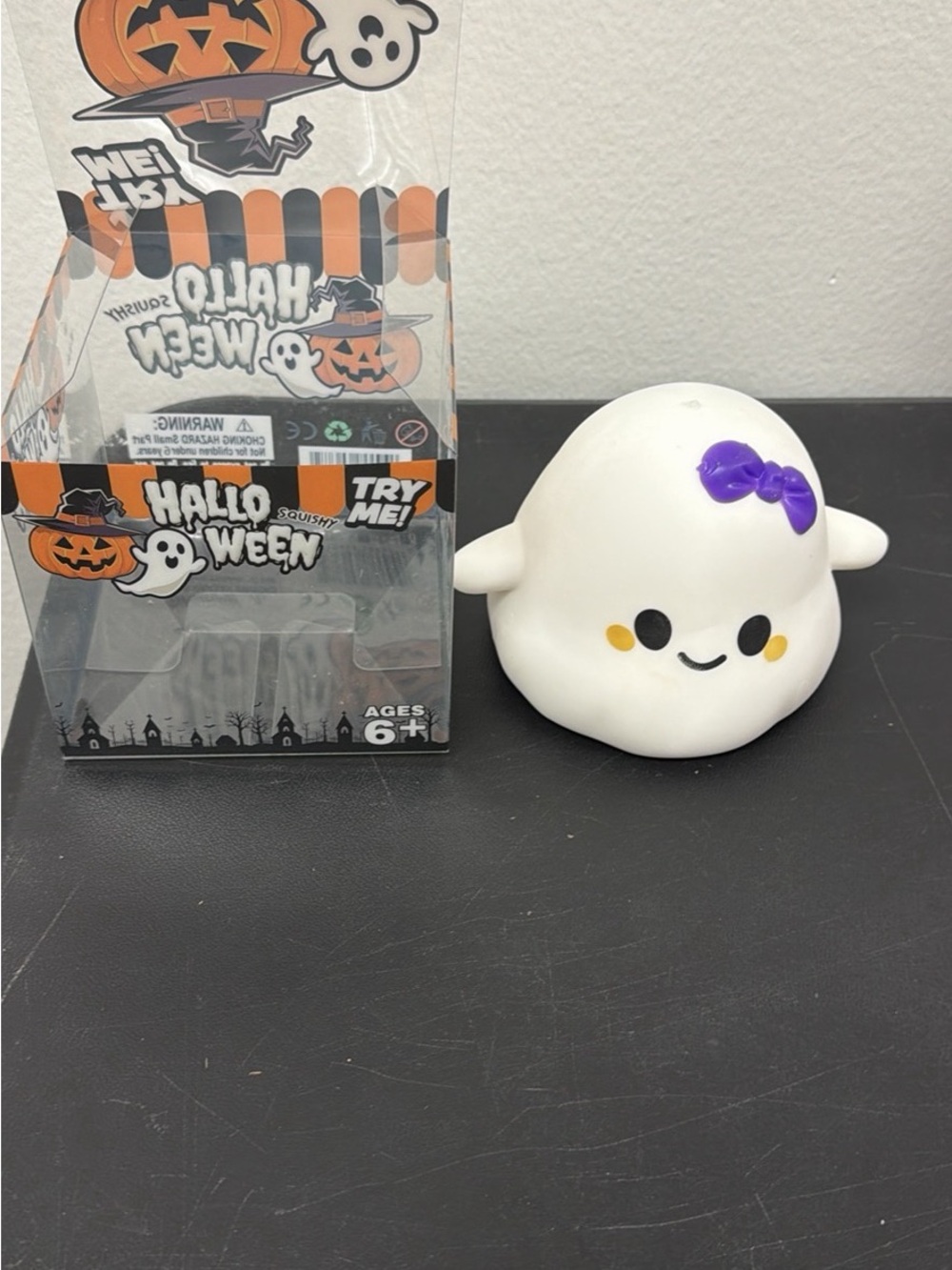 Squeeze White Ghost Squishy Toy with Purple Bow
